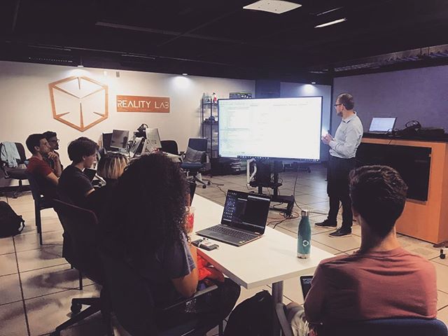 Lab members collaborating with Dr. Barmpoutis during a mentorship session